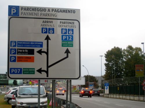 Turin, Italy - Returning a car hire to Turin Airport, car park sign close up - Turin car hire - 02